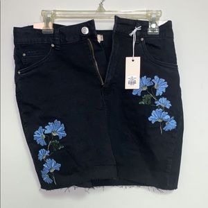 Black mini skirt. Cute!!